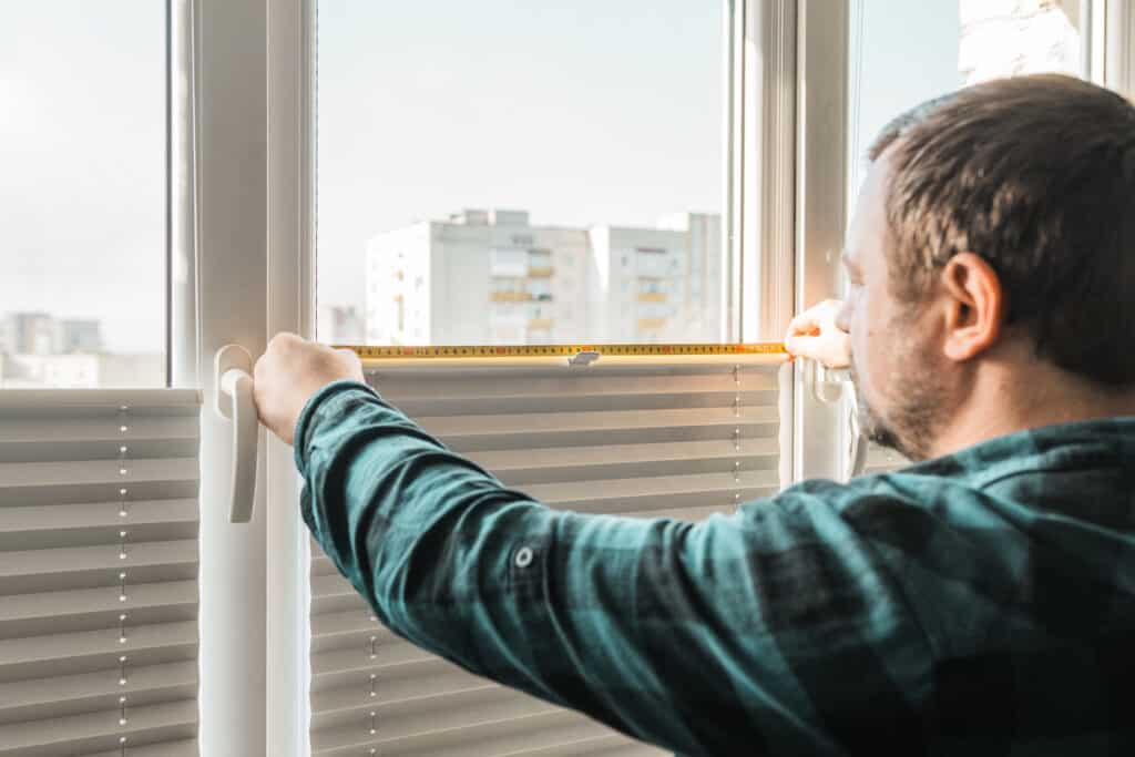 Motorized Blinds North Carolina - Man Installs Blinds