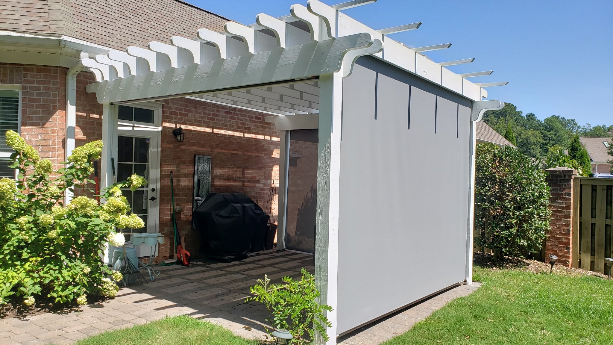 Exterior shades by porch swing